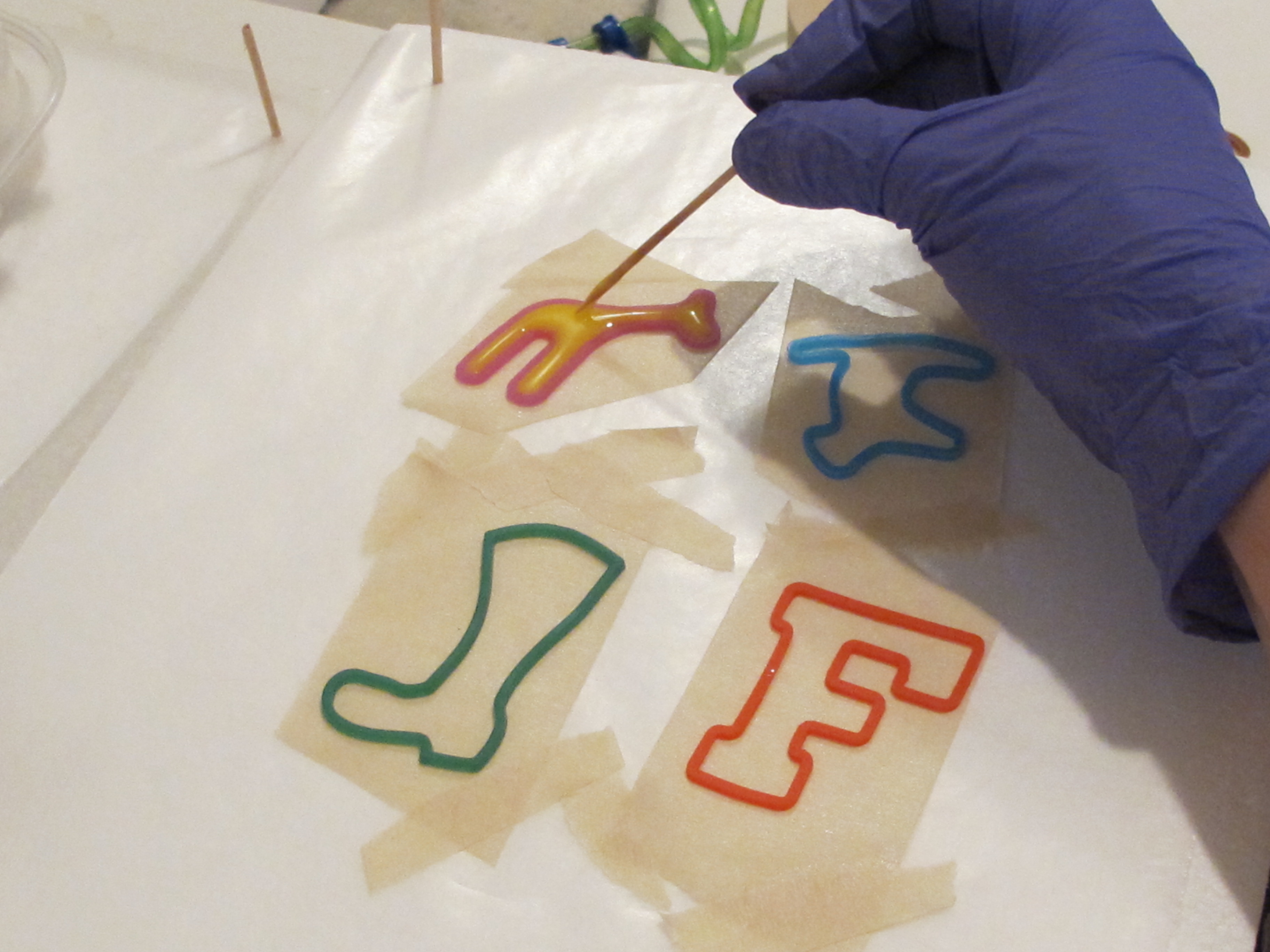 pouring resin into silly bandz