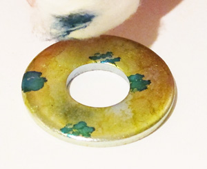 applying alcohol ink to a metal washer