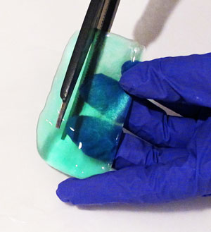 trimming resin with scissors