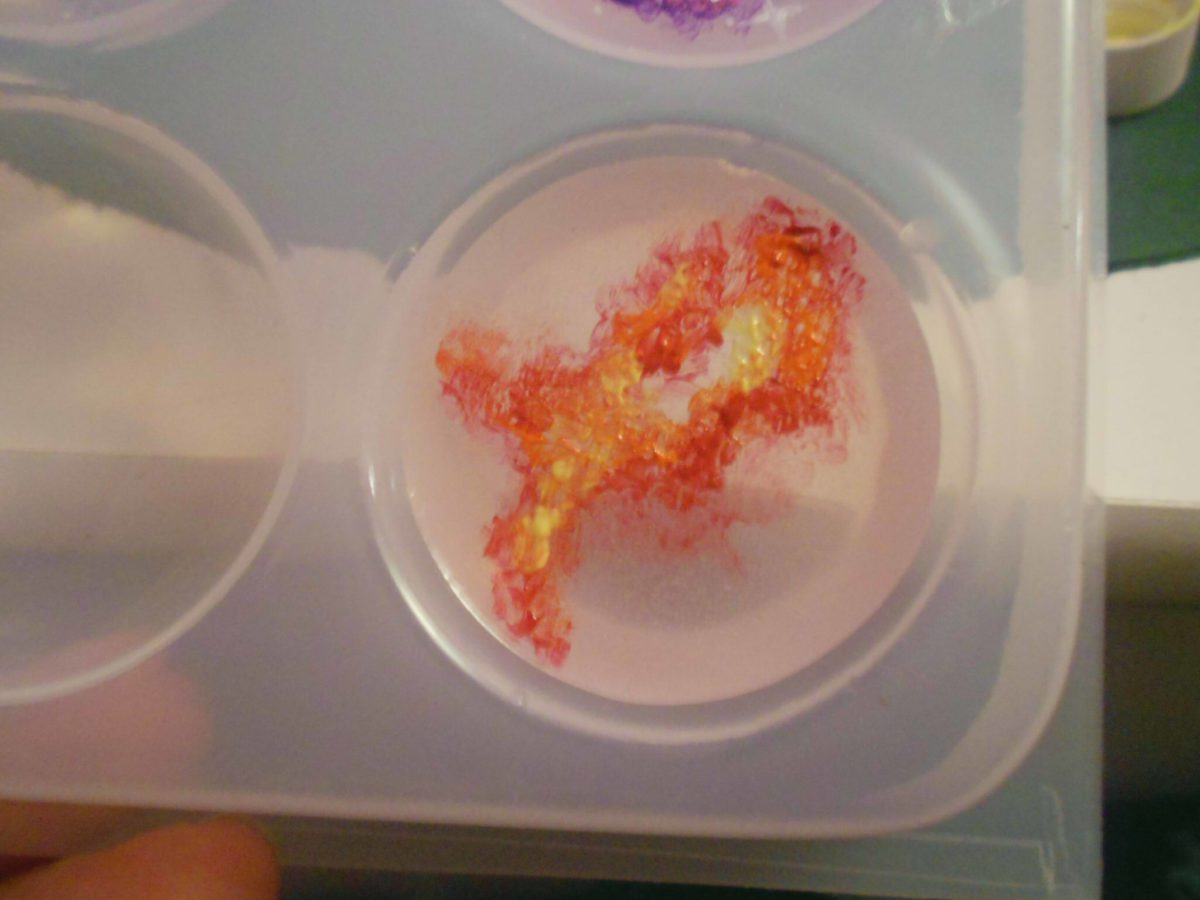 different colors of paint on cured resin