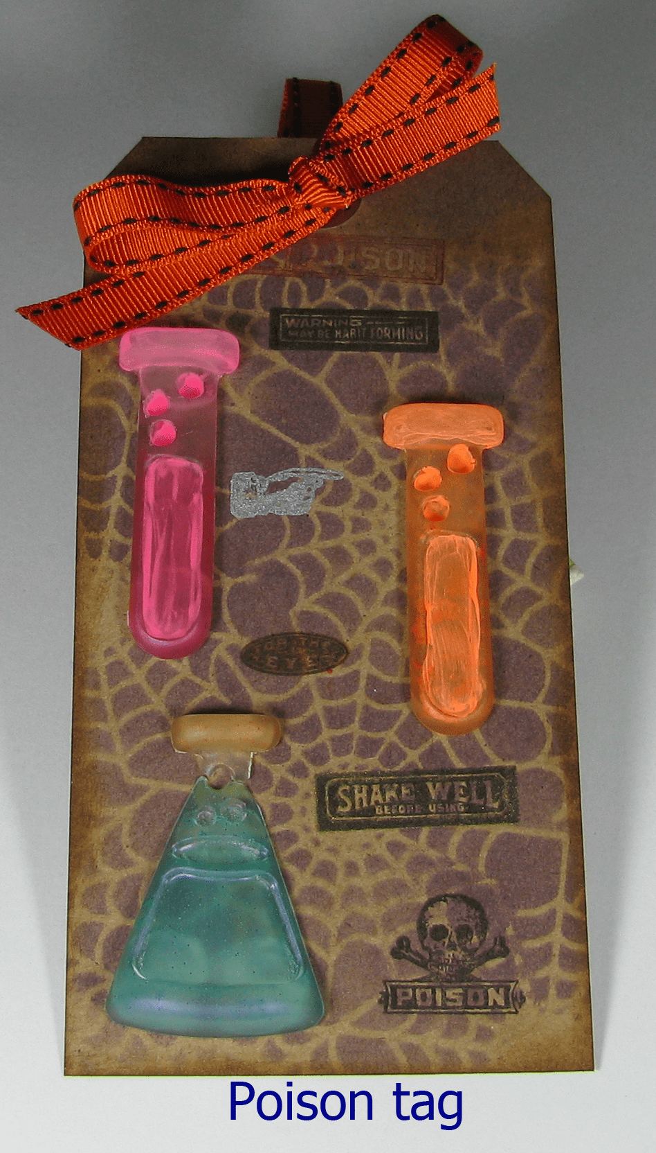 resin beakers on gift tag
