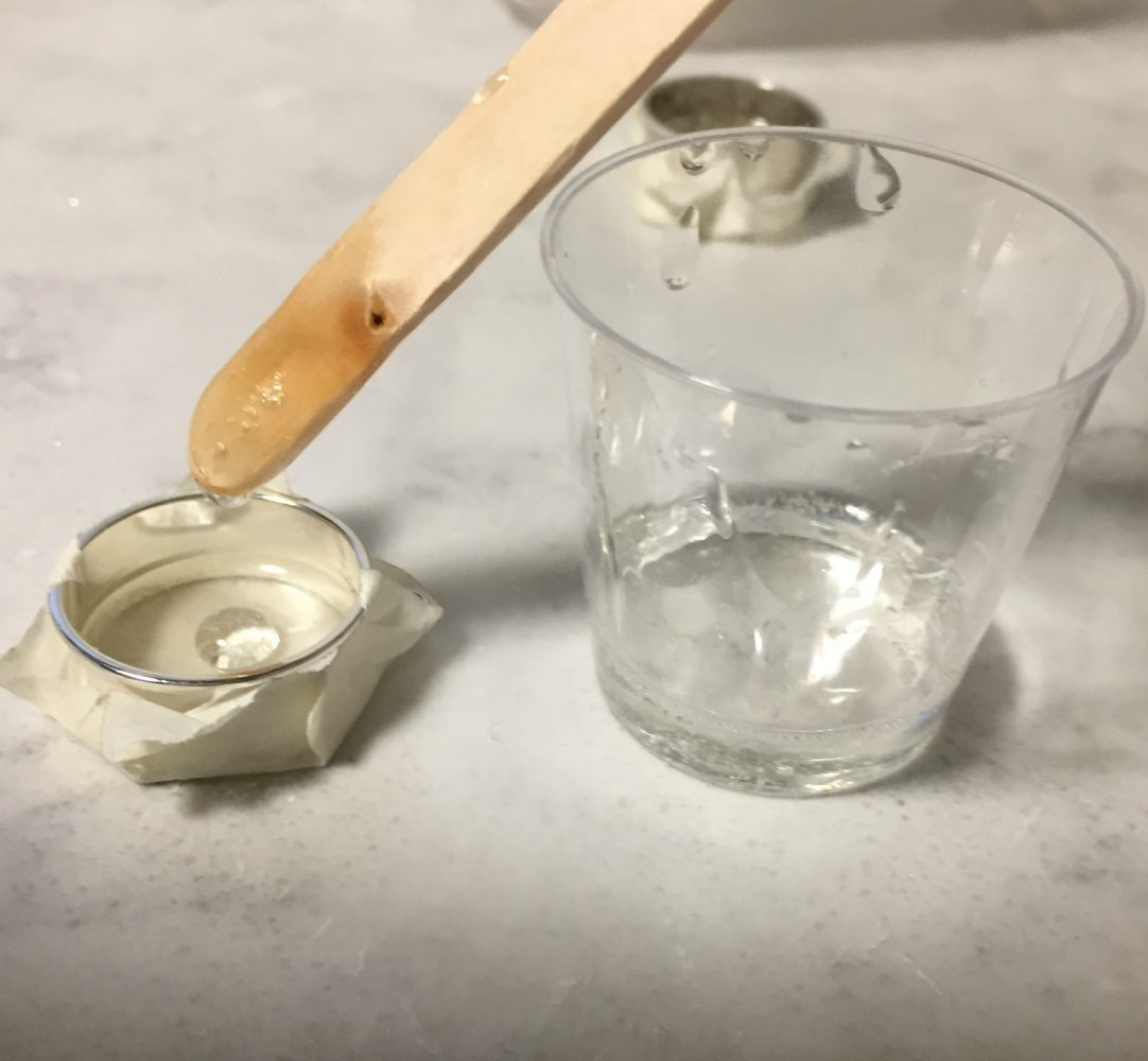 pouring a small amount of resin
