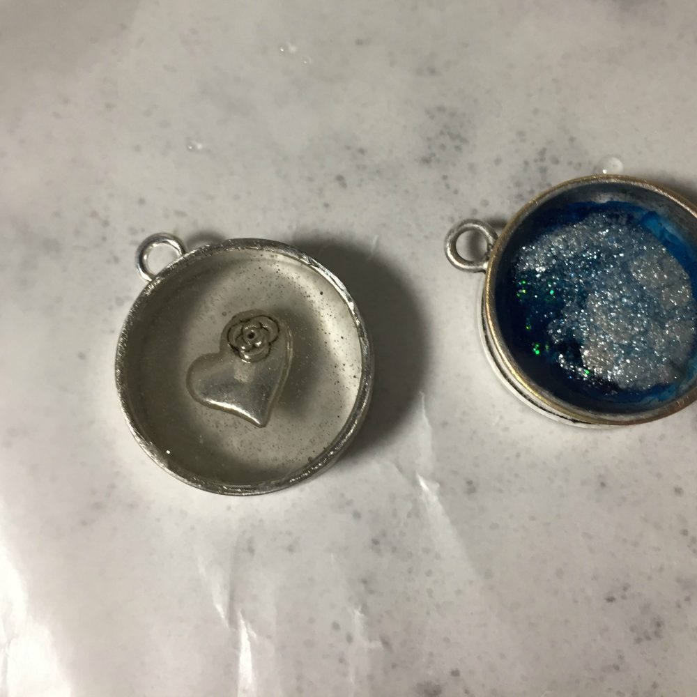 resin poured into open backed bezels