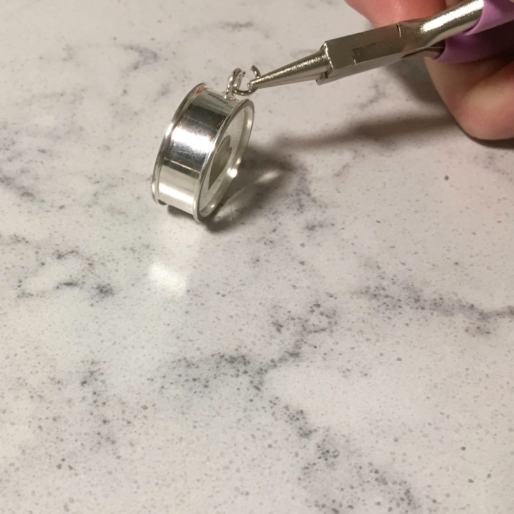 attaching a jump ring to an open backed bezel pendant