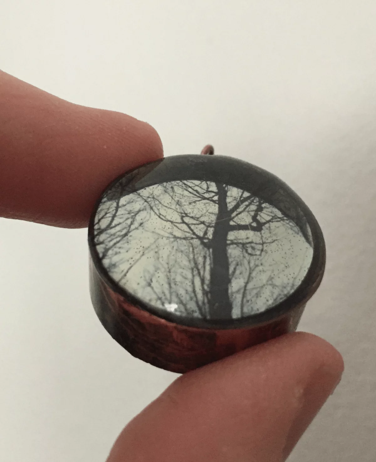 resin and transparency in a metal bezel