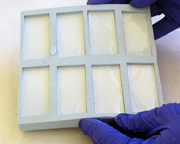 adding a clear layer of resin to a layer of white resin