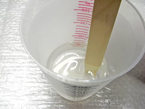 mixing resin in a cup