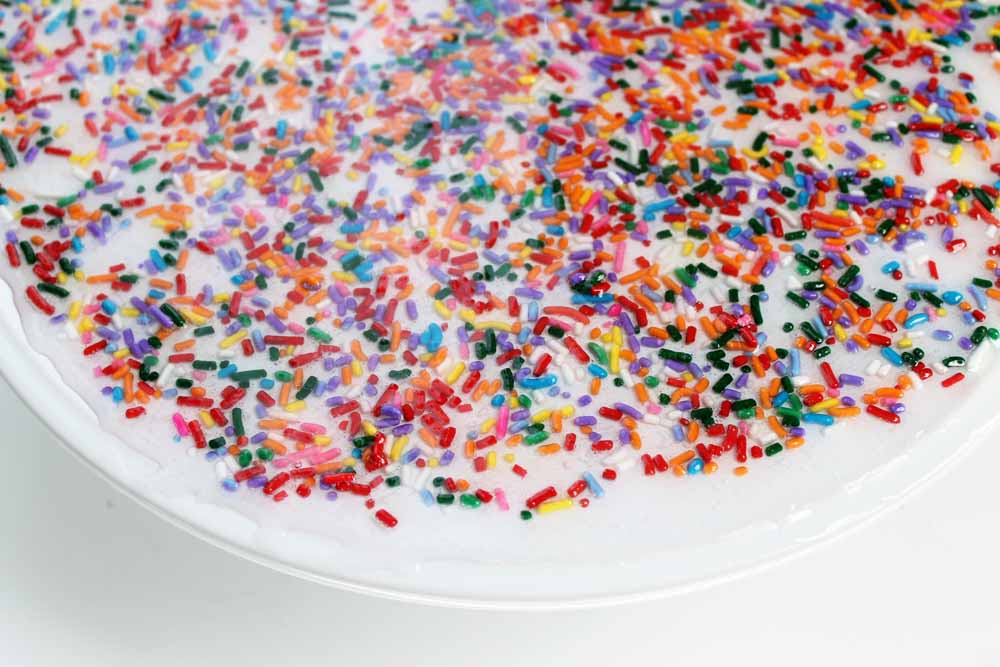 resin and sprinkles on a cake stand
