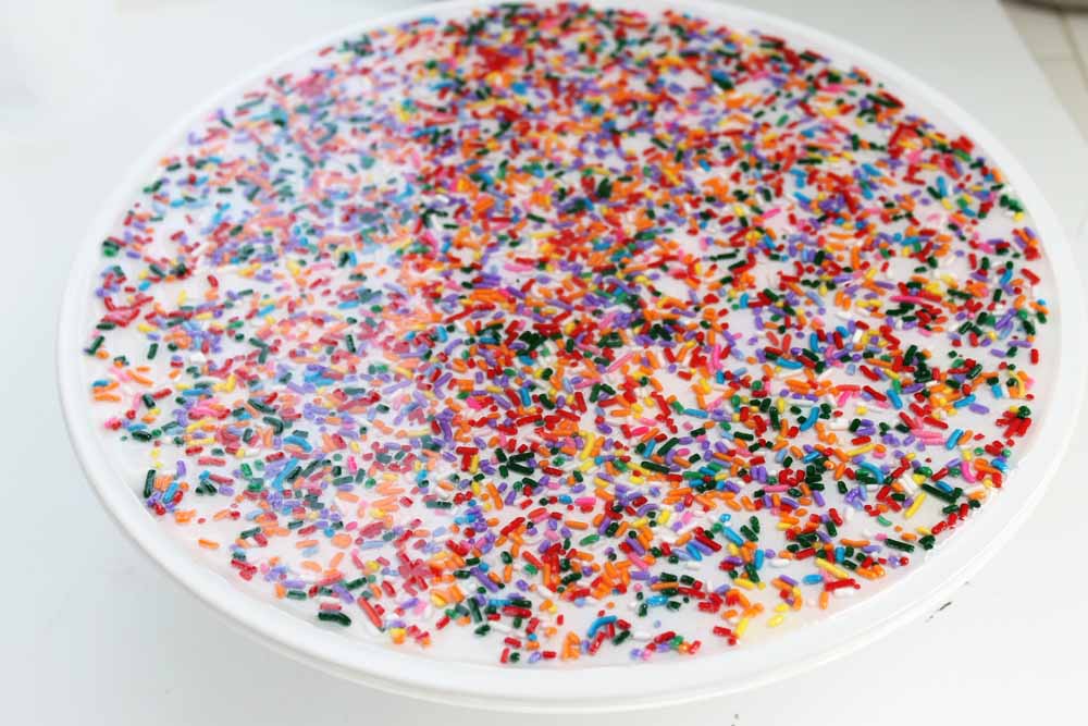 resin and sprinkles coated on a cake stand