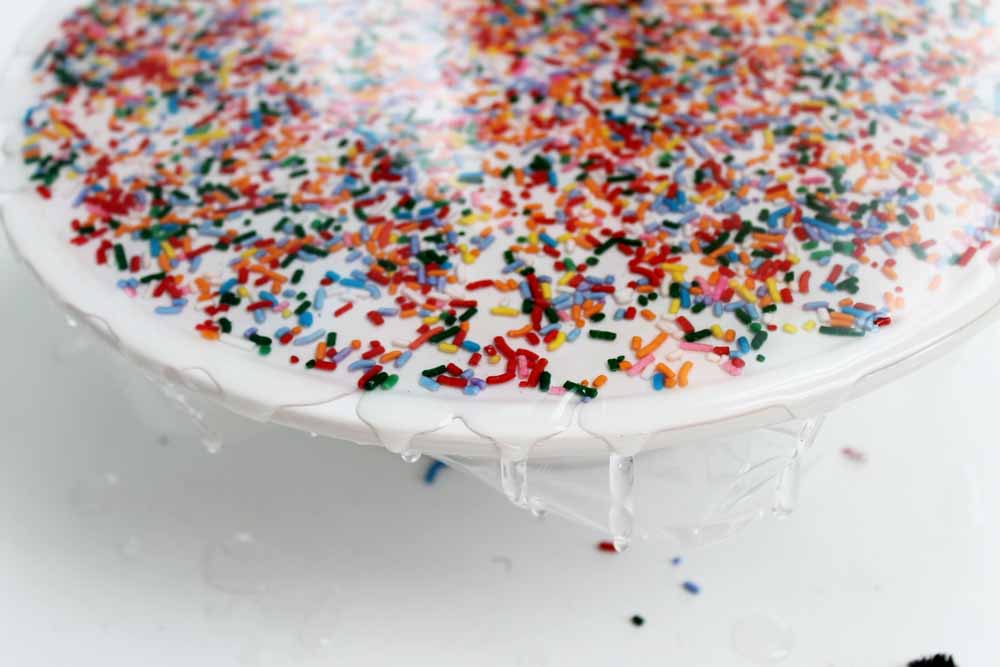 resin and sprinkles on a cupcake stand