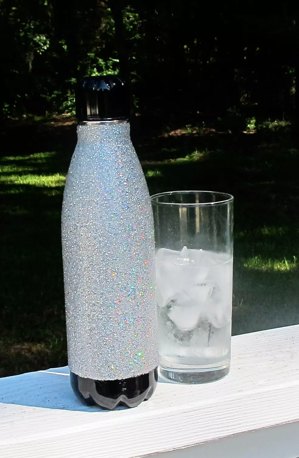 stainless steel tumbler covered with glitter and resin