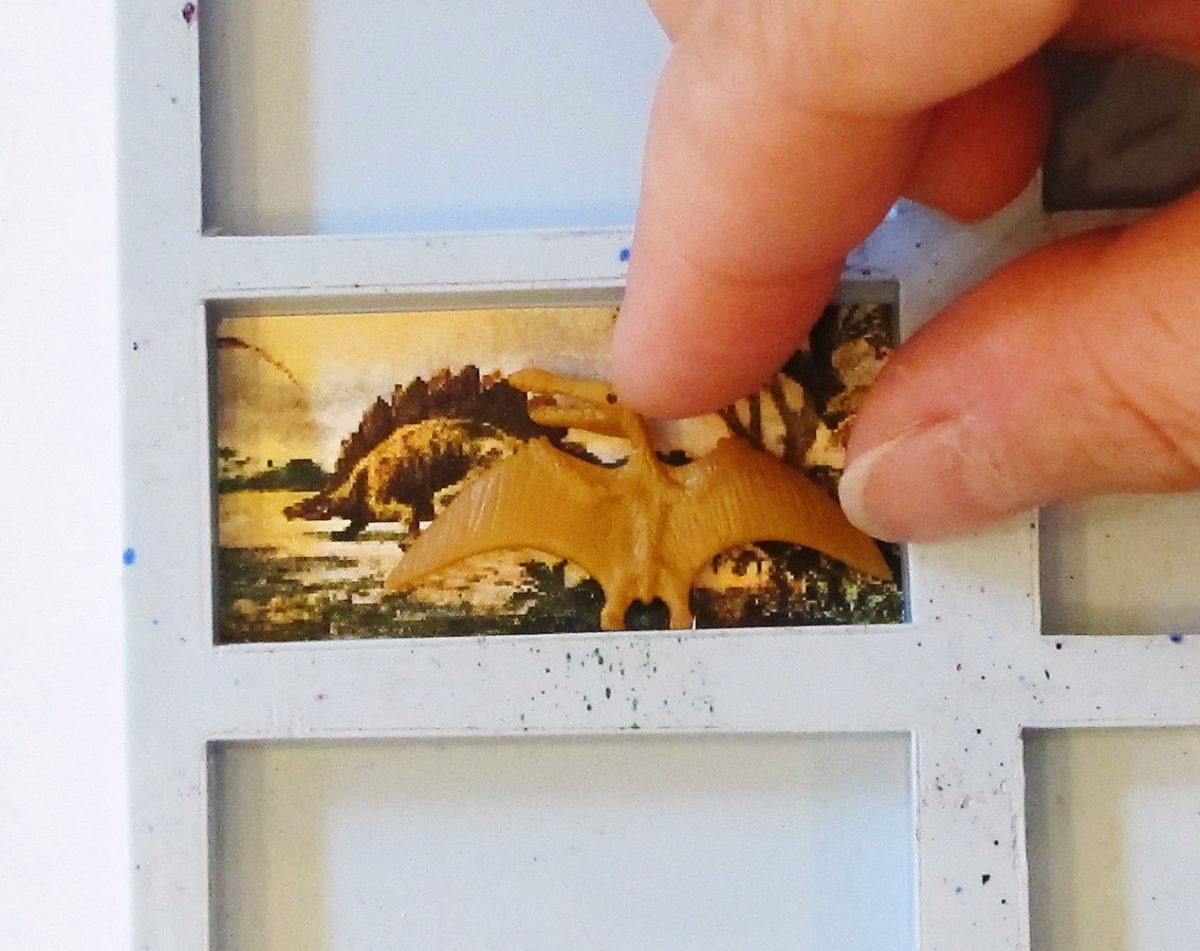 fitting dinosaur and clip art into mold