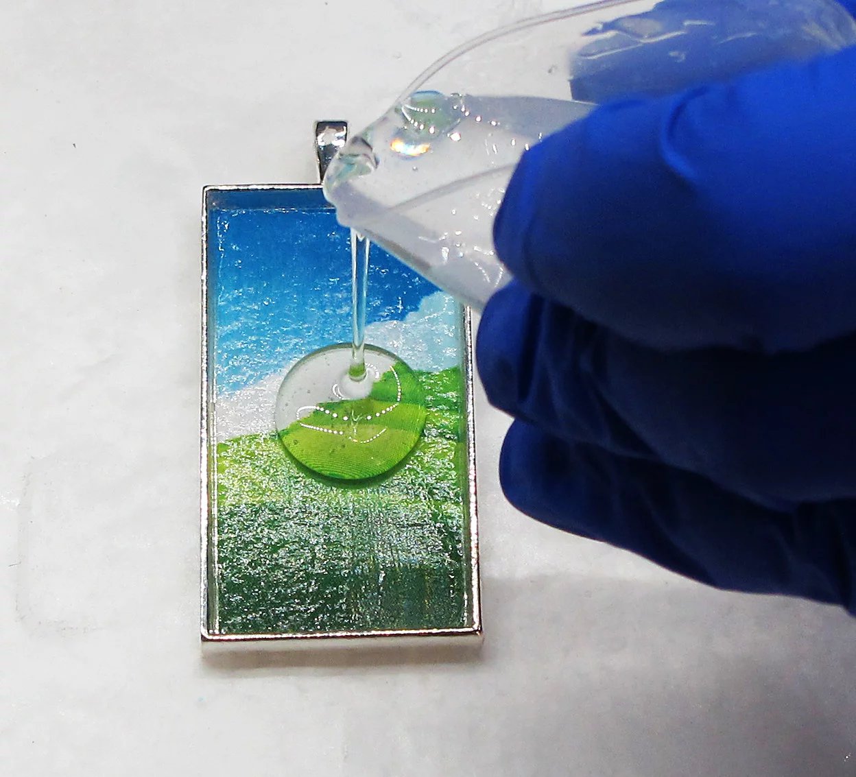 pouring resin into a bezel