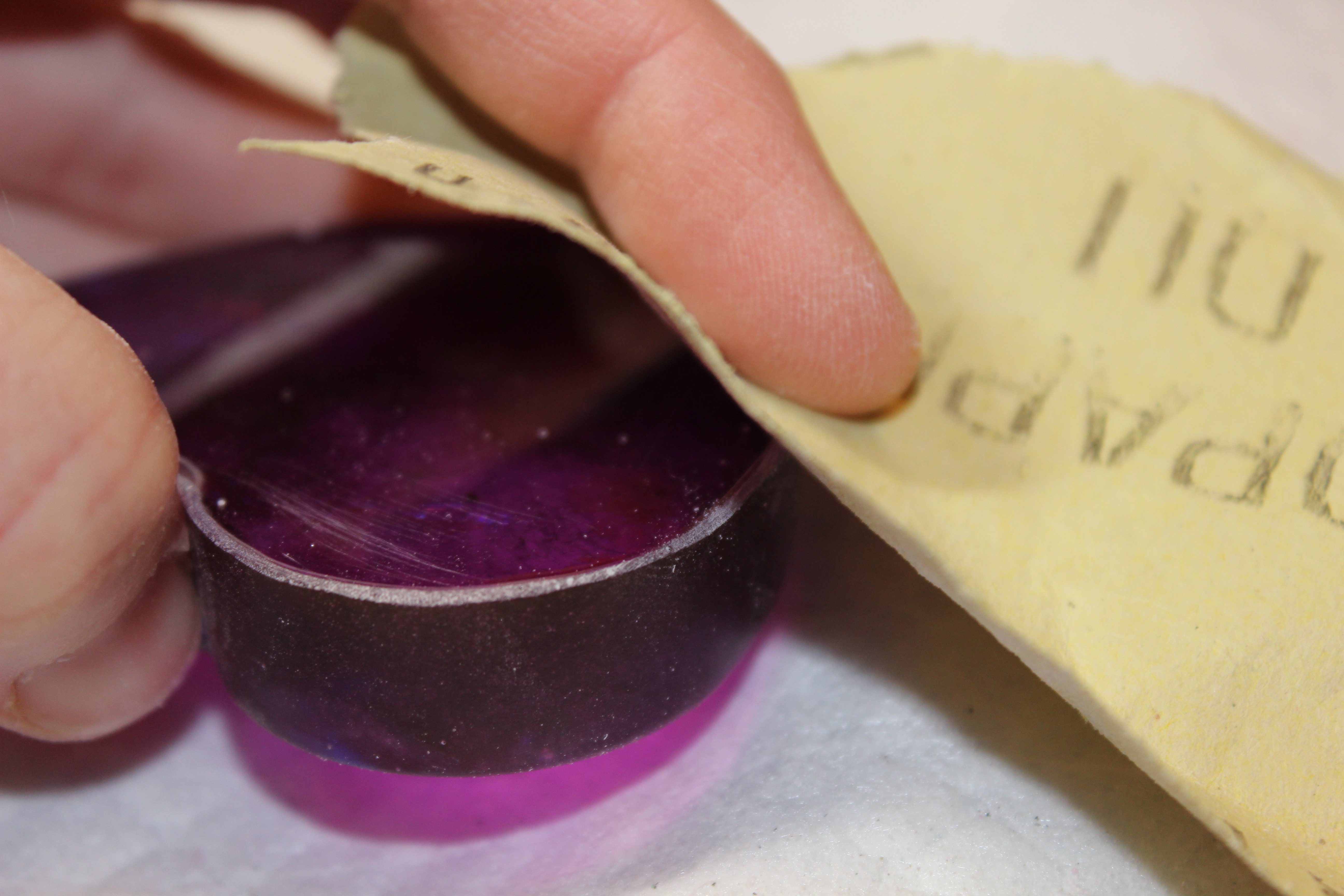 sanding with fine grade sandpaper to finish