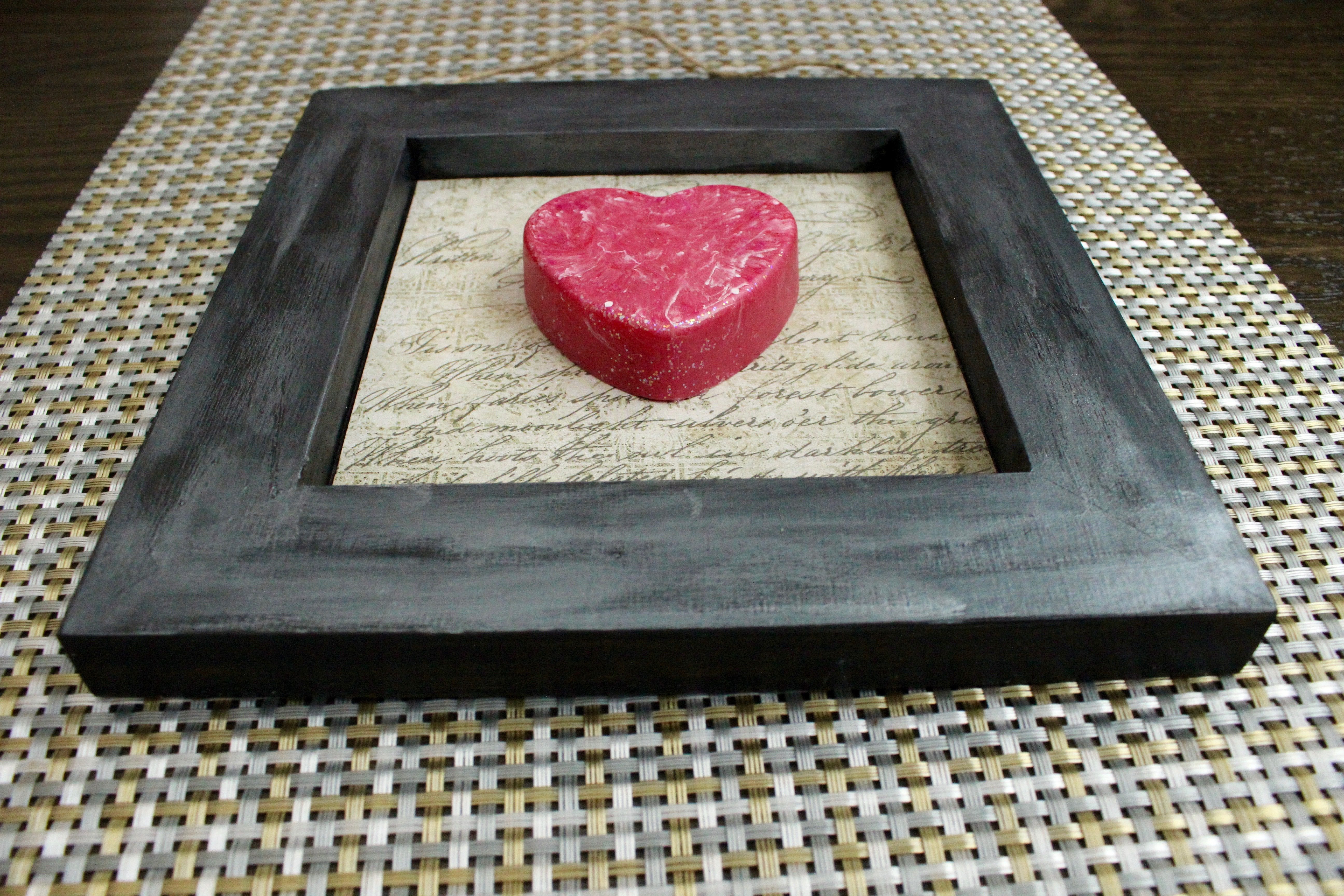 pink resin heart in frame
