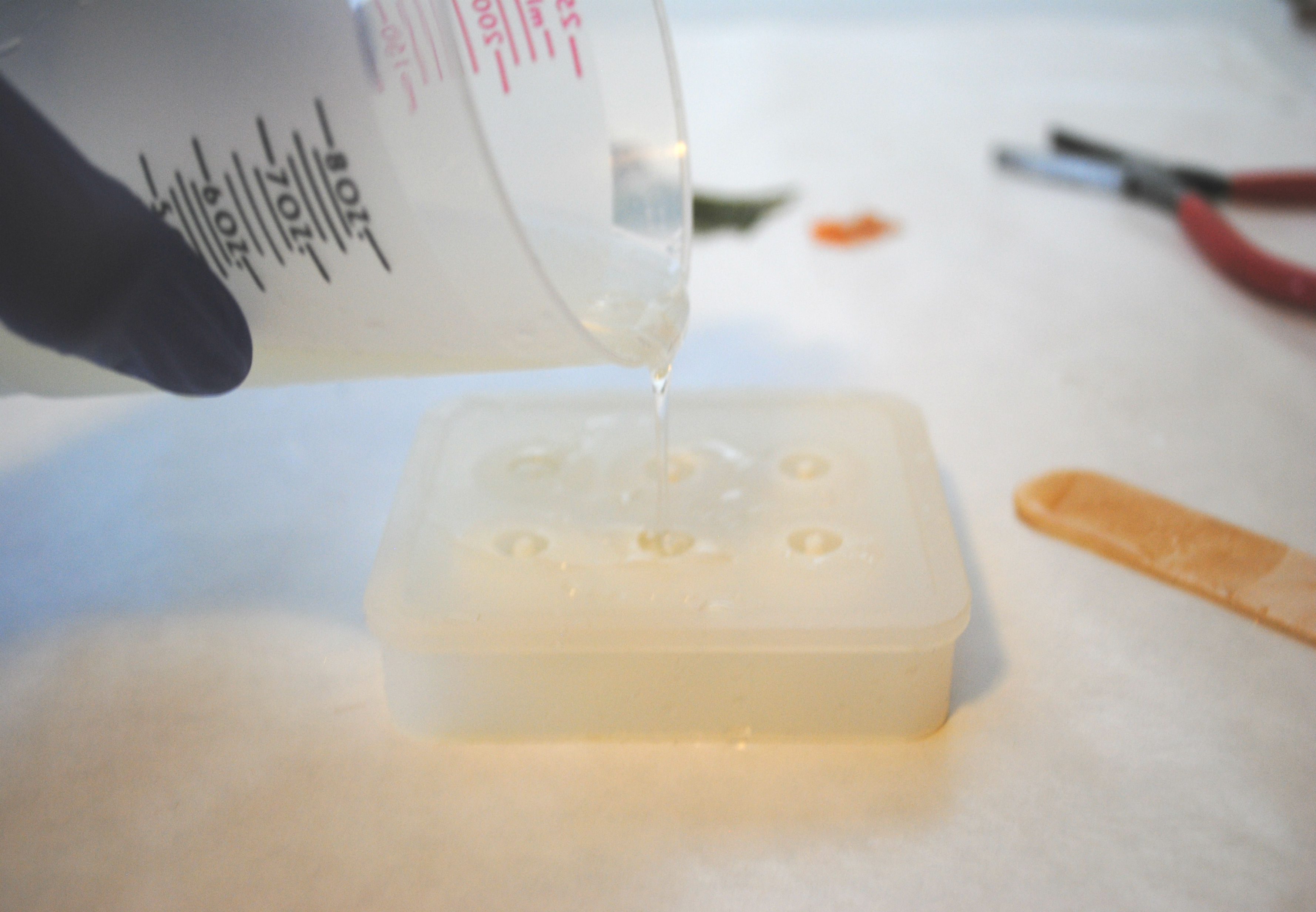 pouring resin into mold