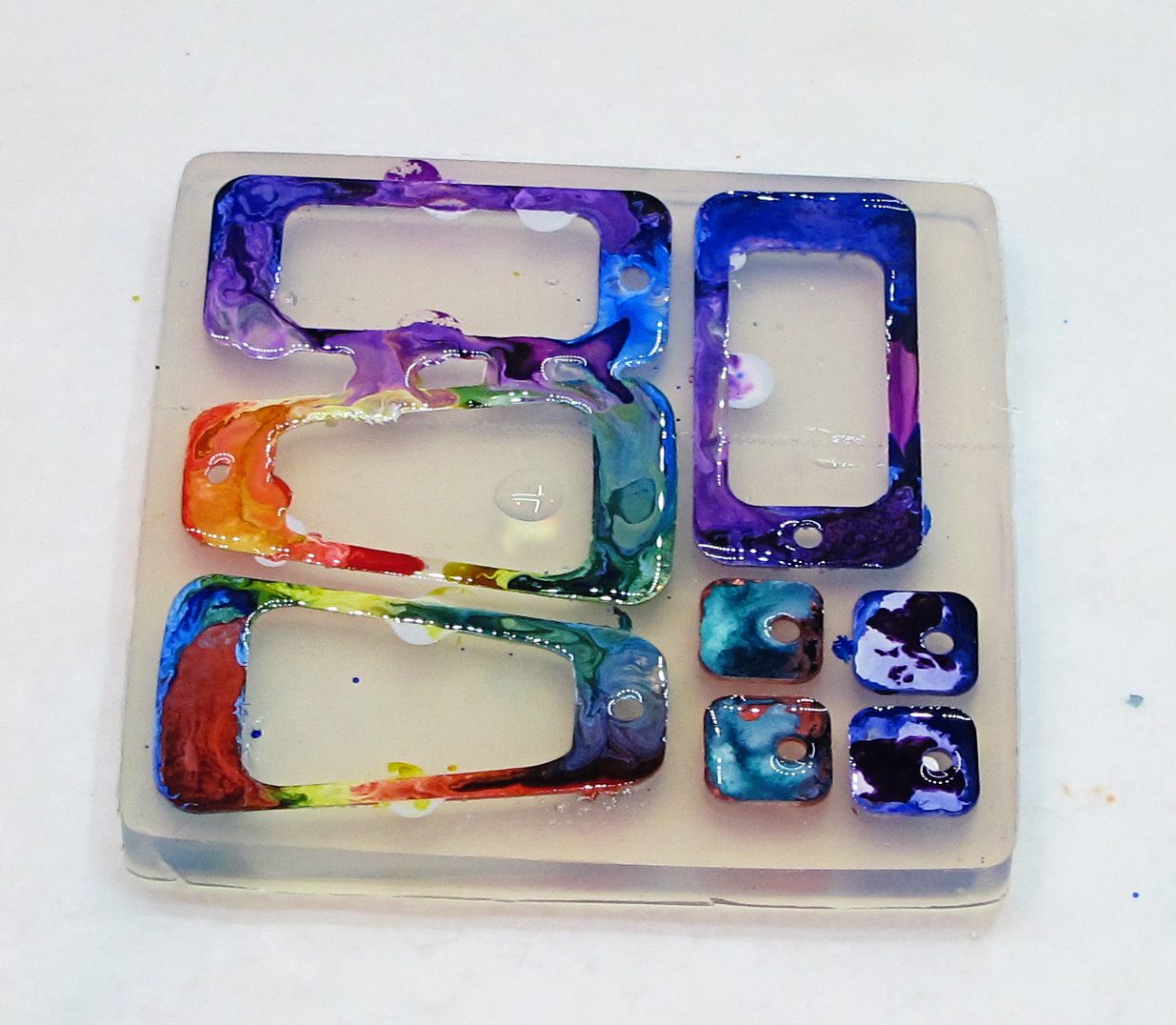 colored ink and resin in a silicone mold