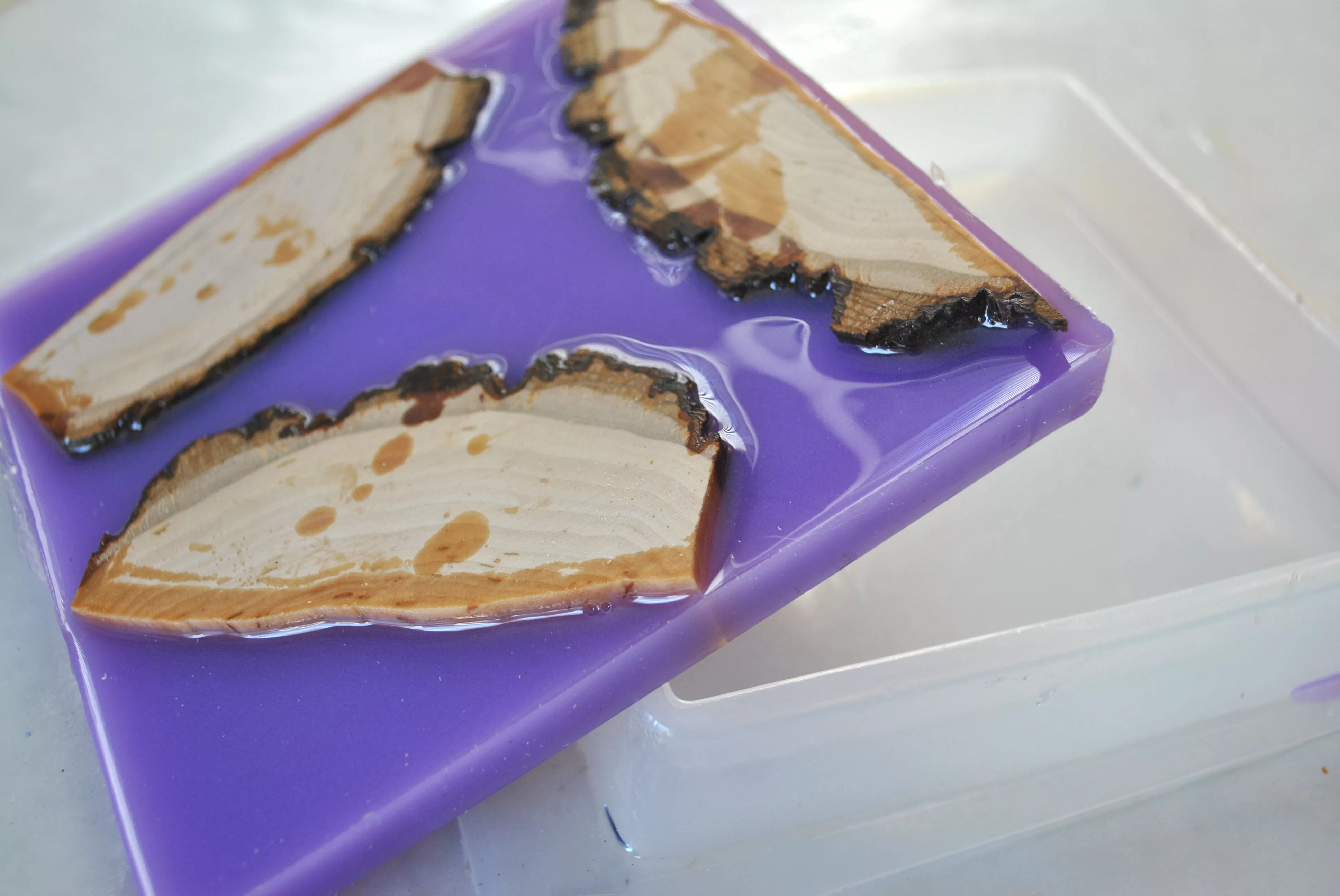 three wood cuts in lavender resin and square resin mold