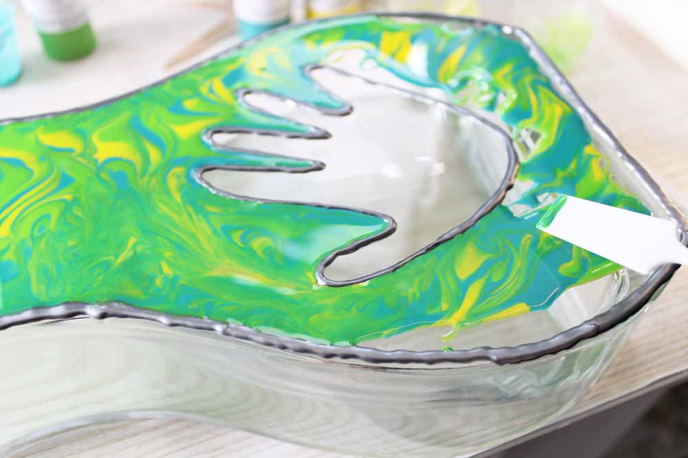 flat suded vase with resin paint and child's handprint