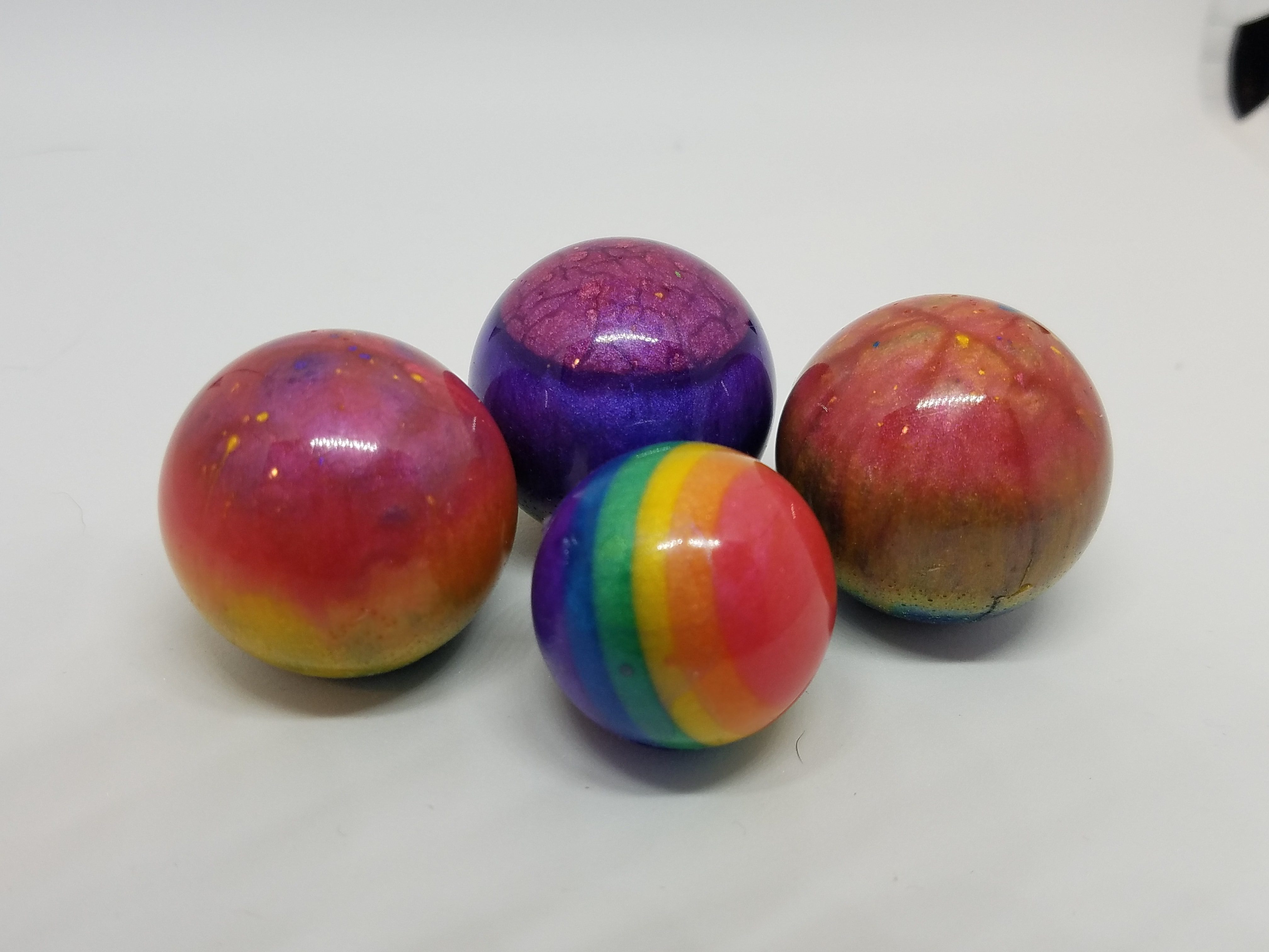 Rainbow colored resin orbs