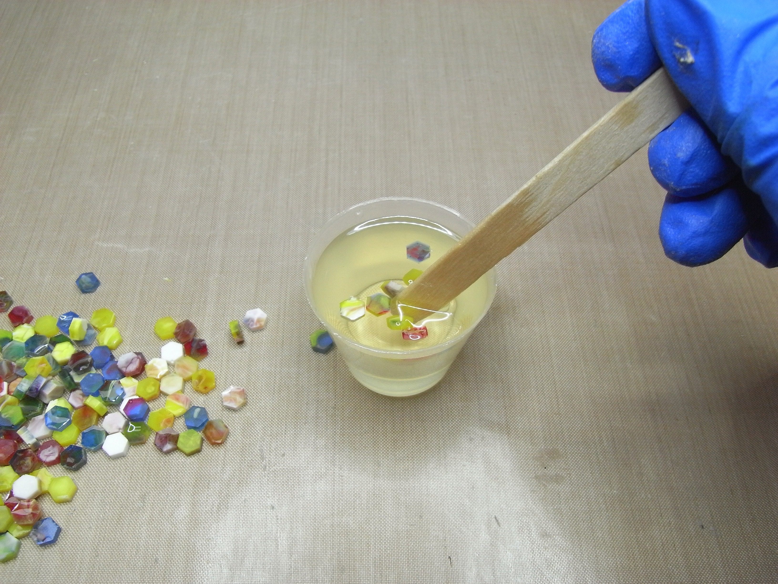 coating resin hexagon pieces in resin