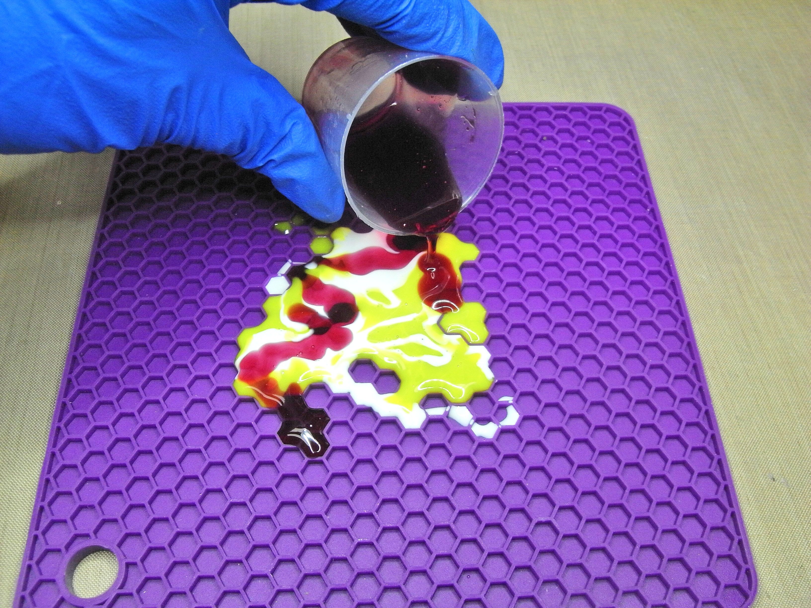 poring resin onto silicone mat