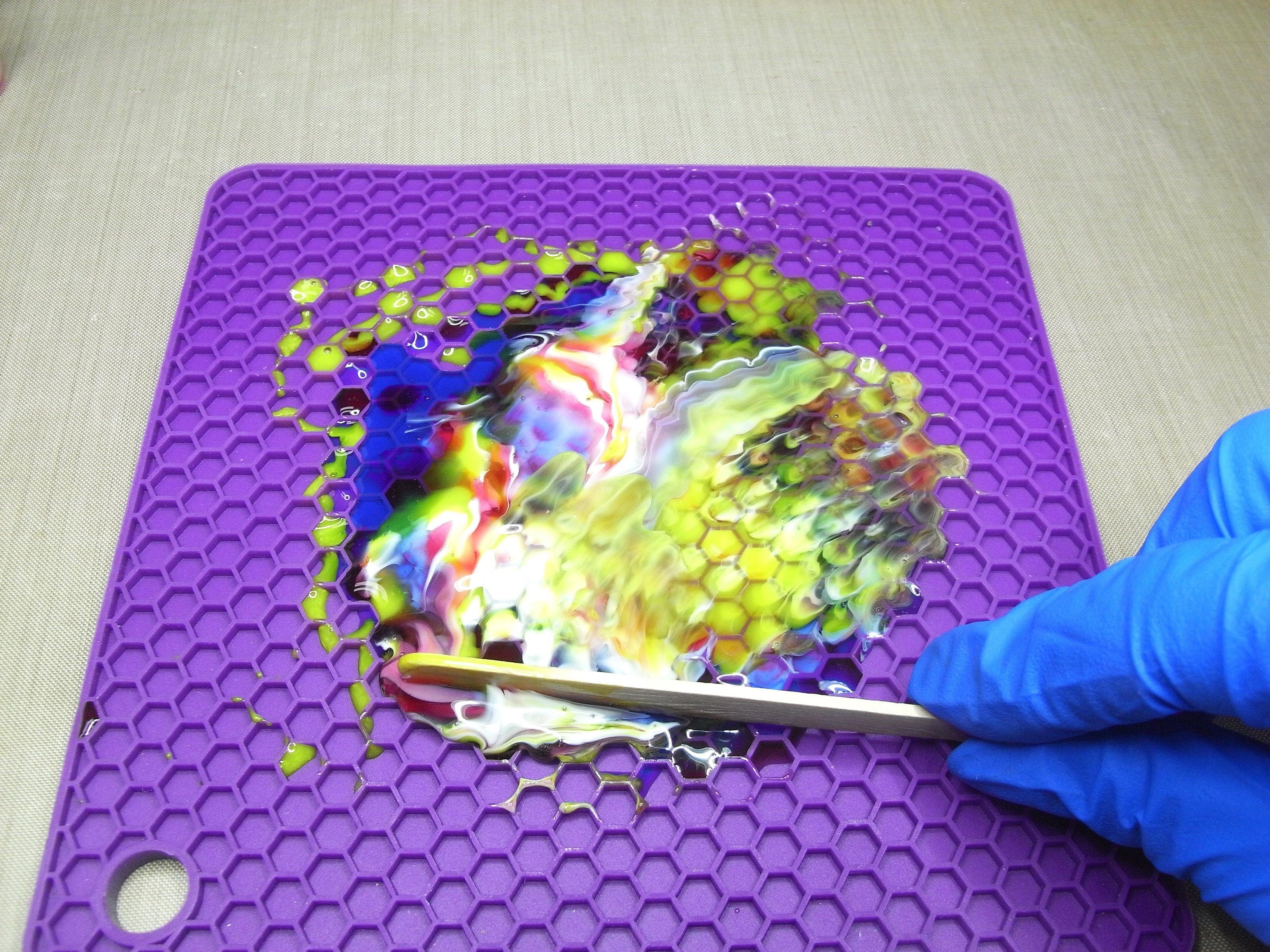 spreading resin on silicone mat