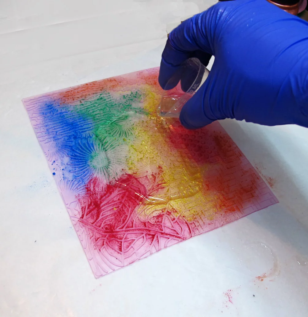 applying resin to a stamp surface
