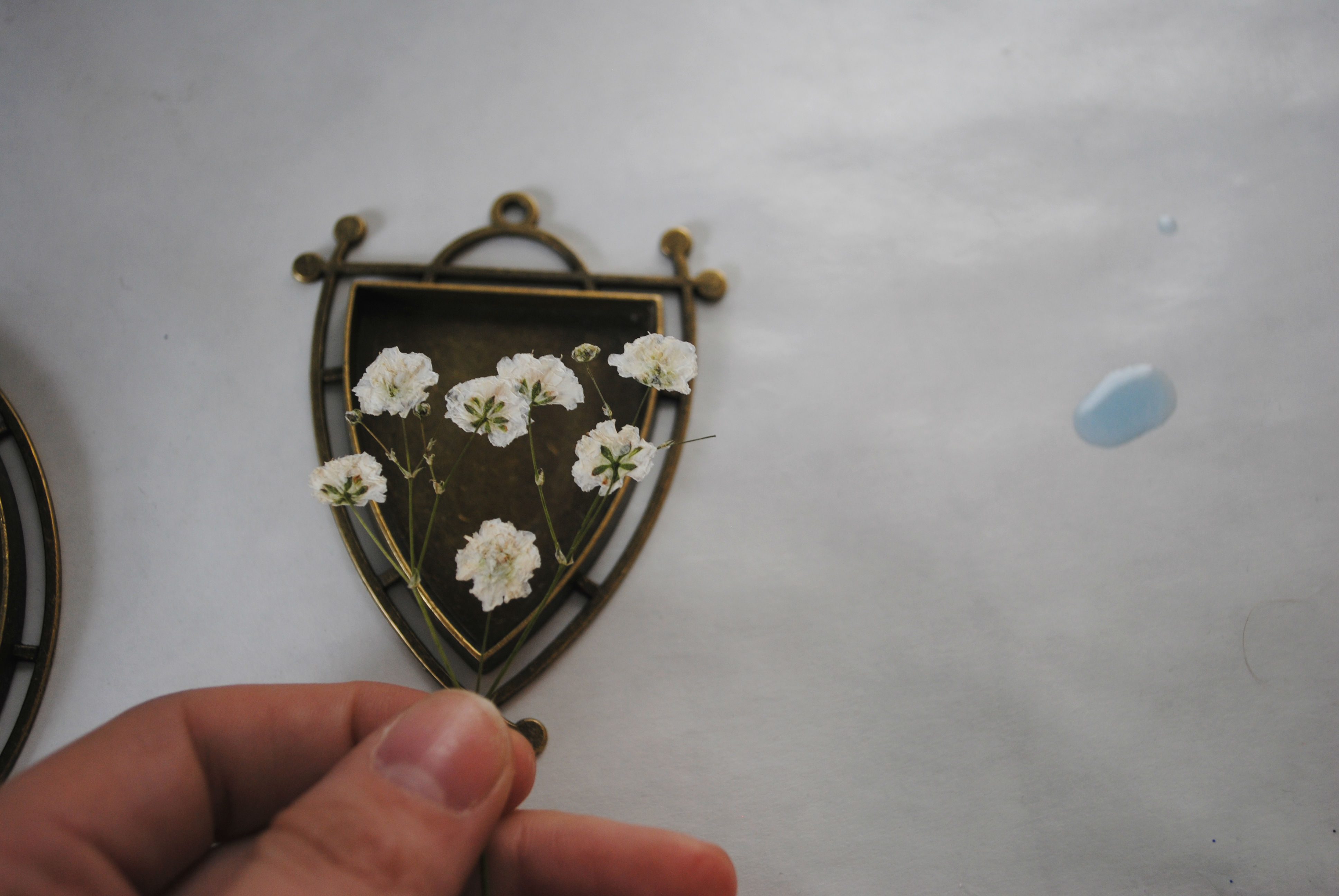 sizing a flower for resin jewelry