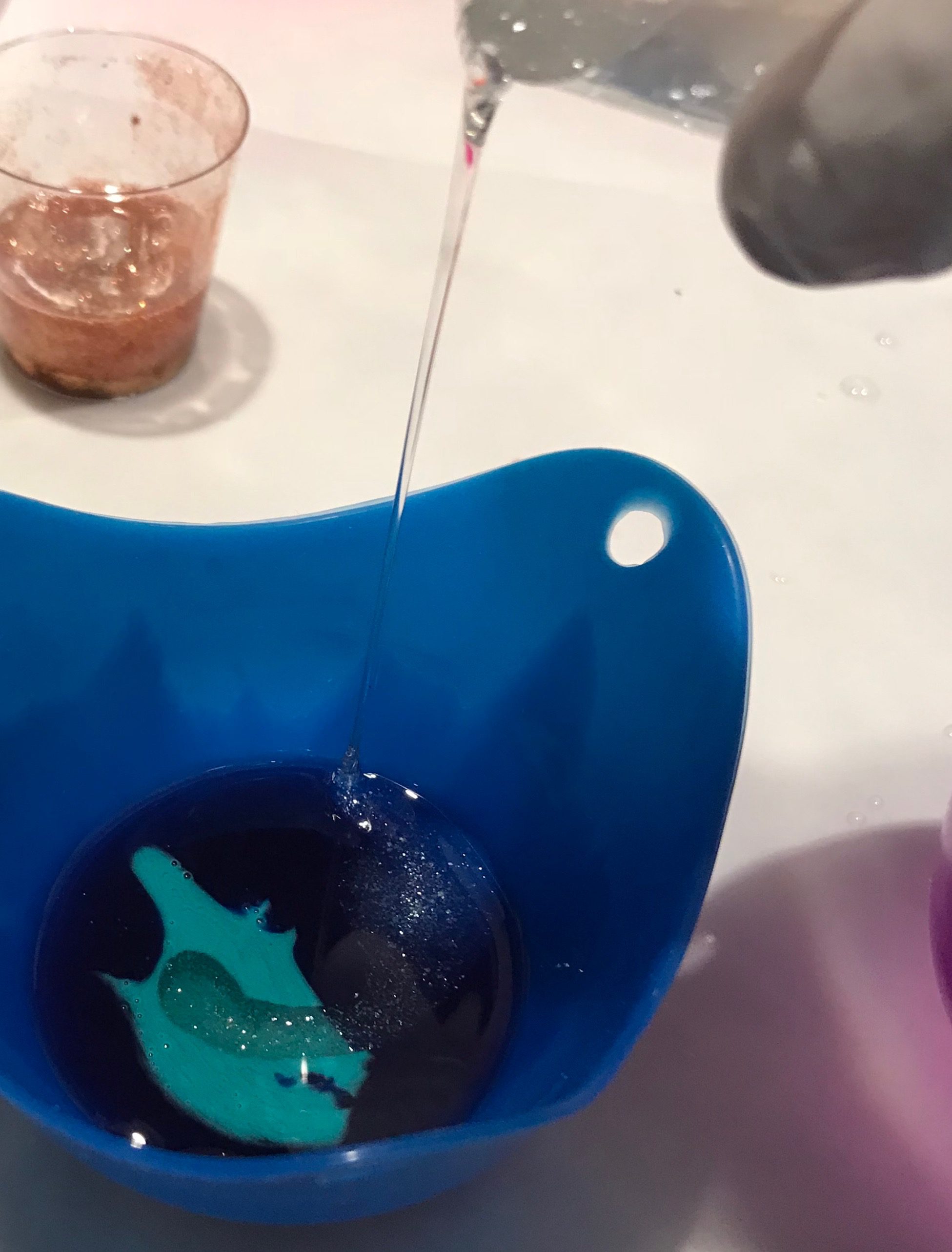 pouring resin into mold