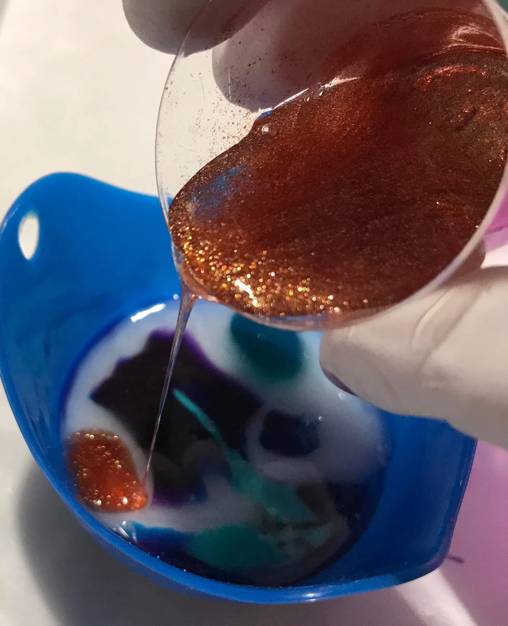 pouring resin into mold