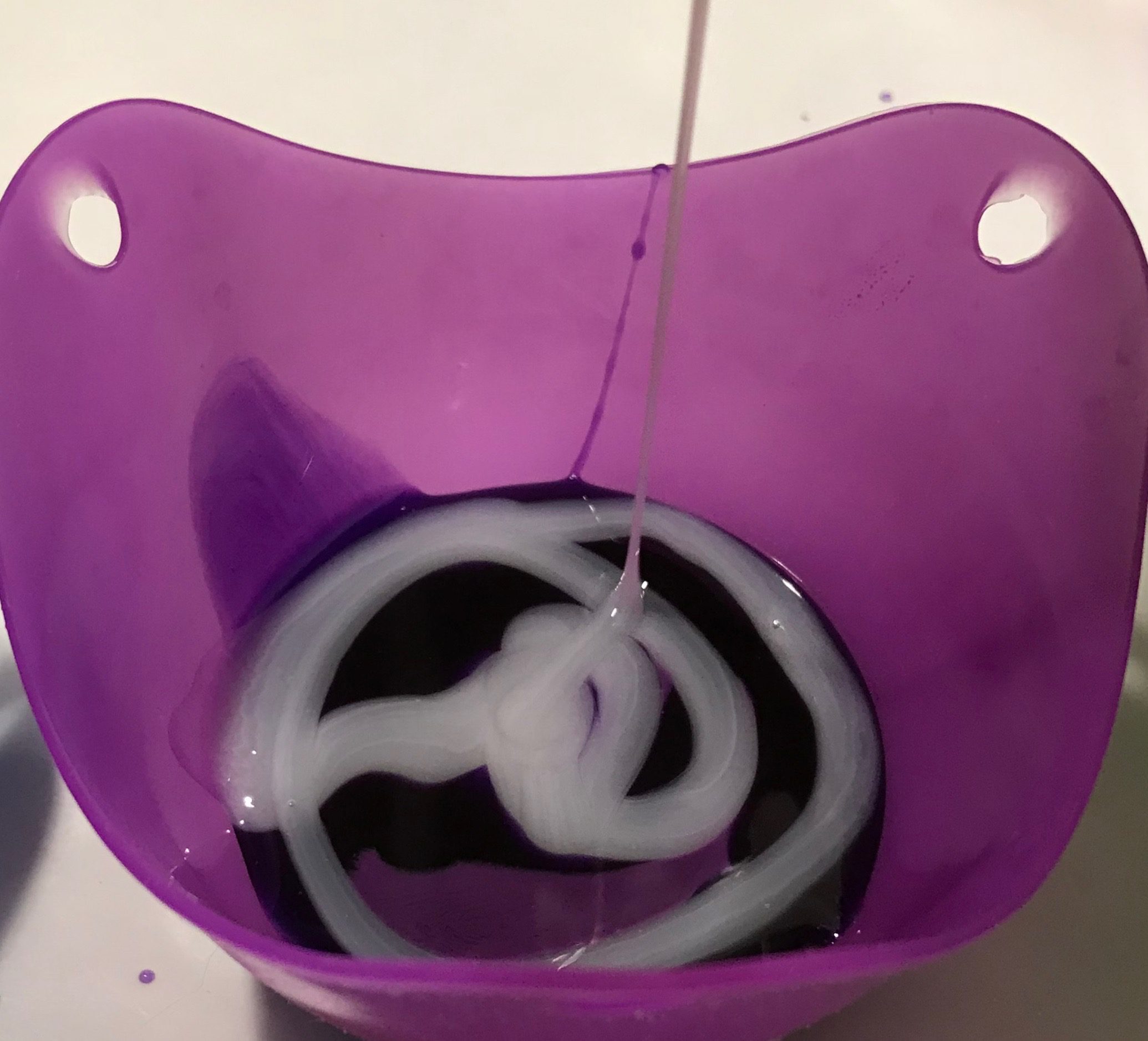 pouring resin into mold