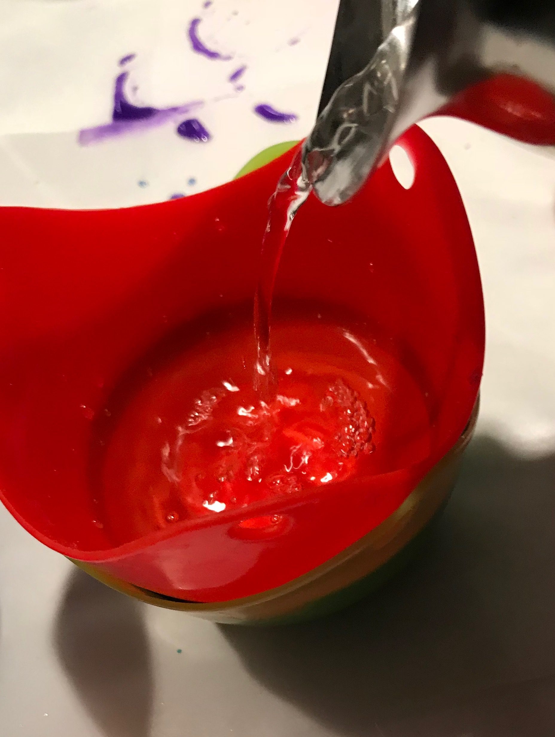 pouring water into silicone mold