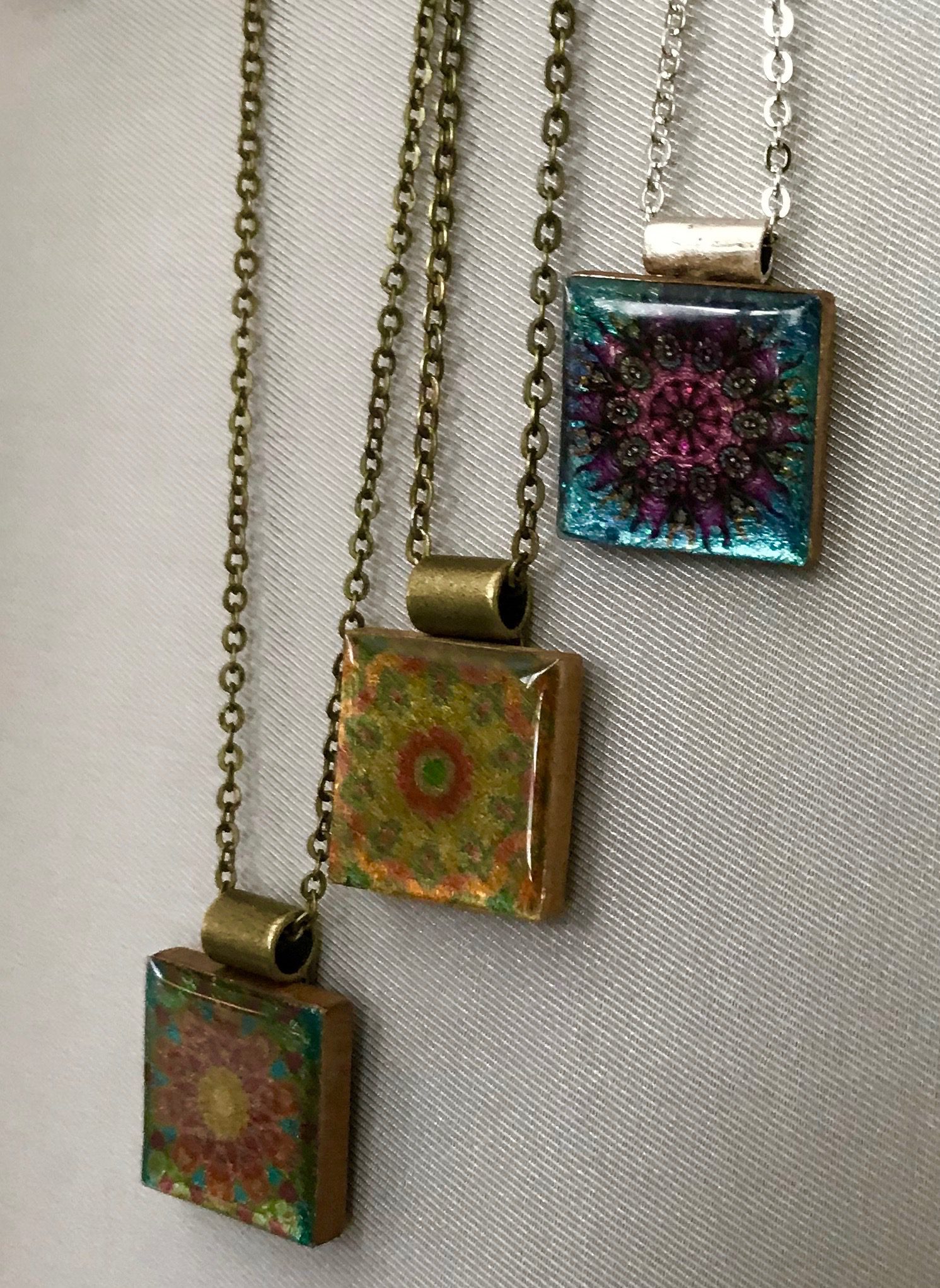gleaming mandala pendants