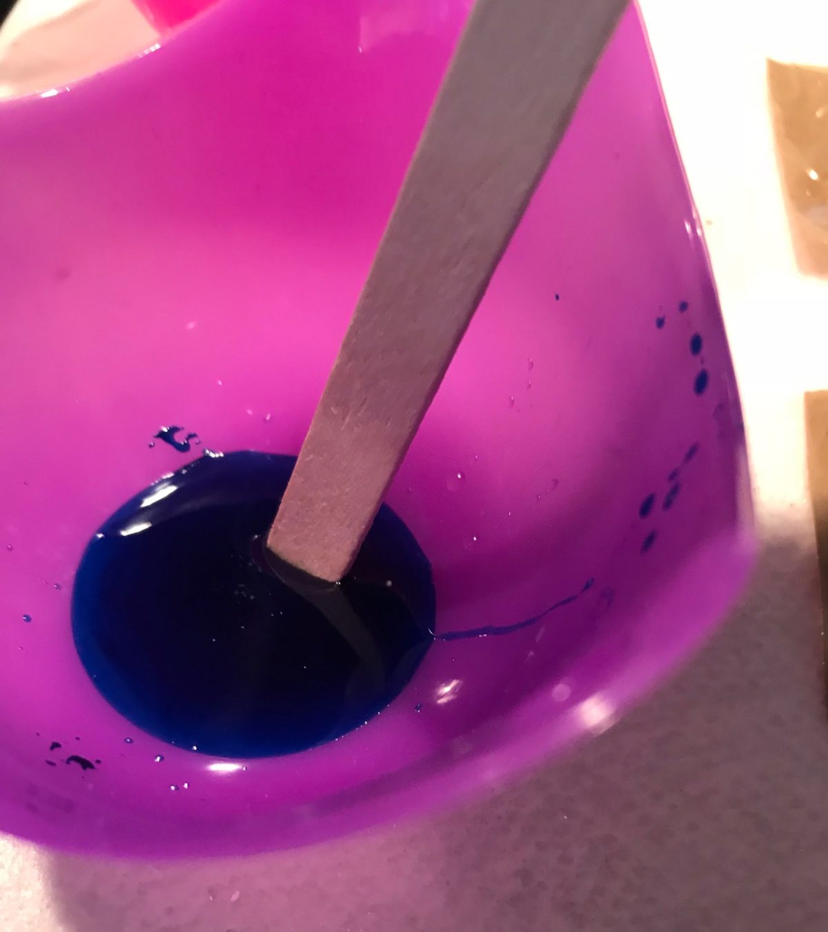 stirring color into resin