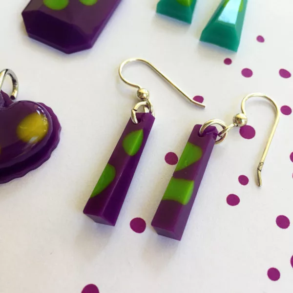purple and green resin earrings