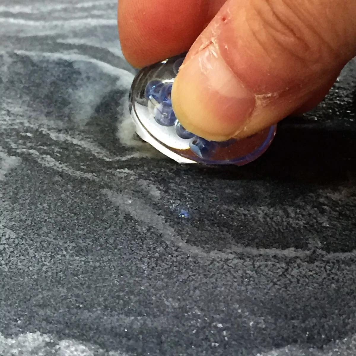 sanding resin charms on wet dry sandpaper
