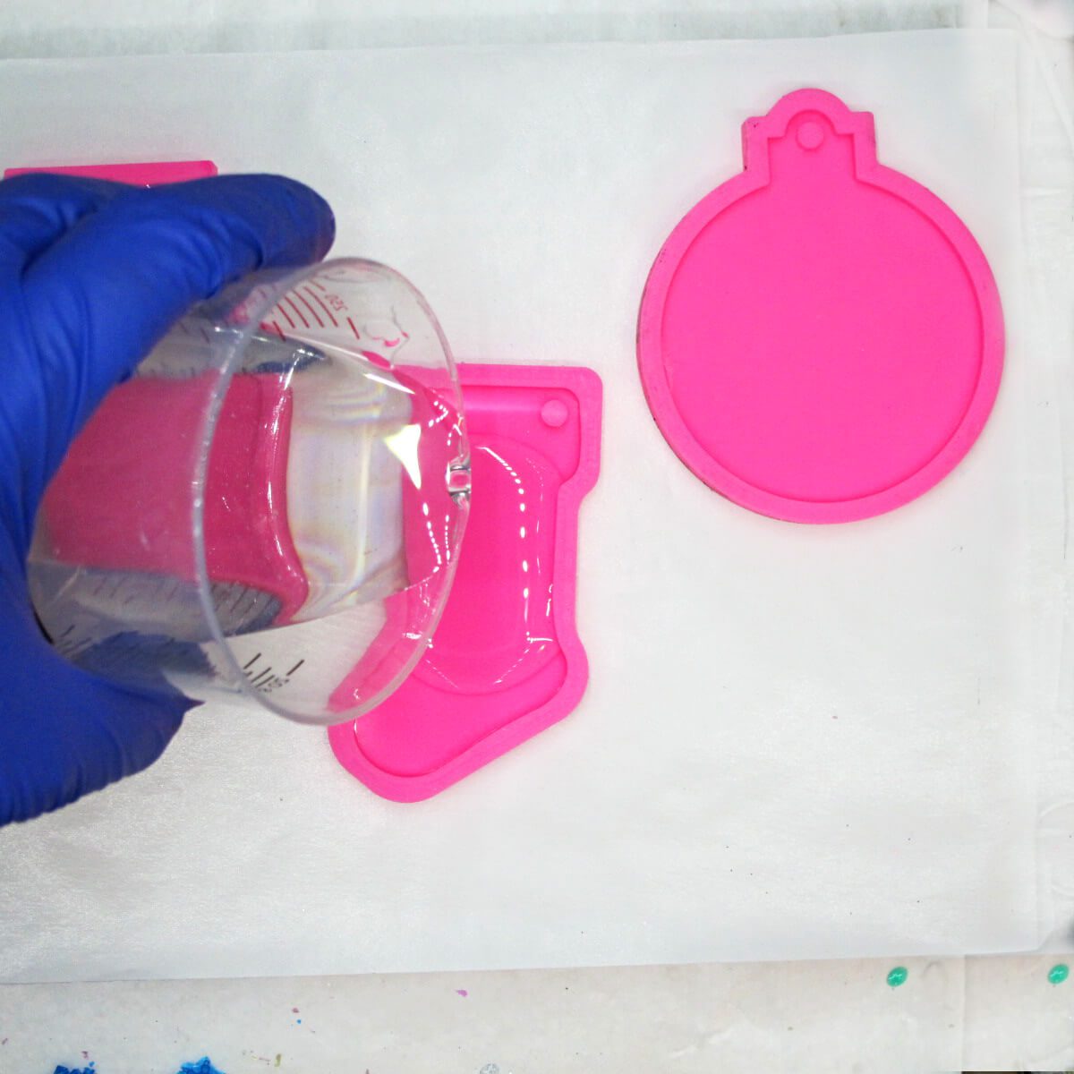 filling a silicone ornament mold with resin