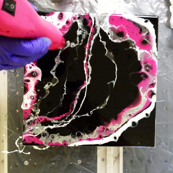 applying heat to epoxy art with a heat gun