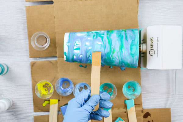 spreading resin on a tumbler