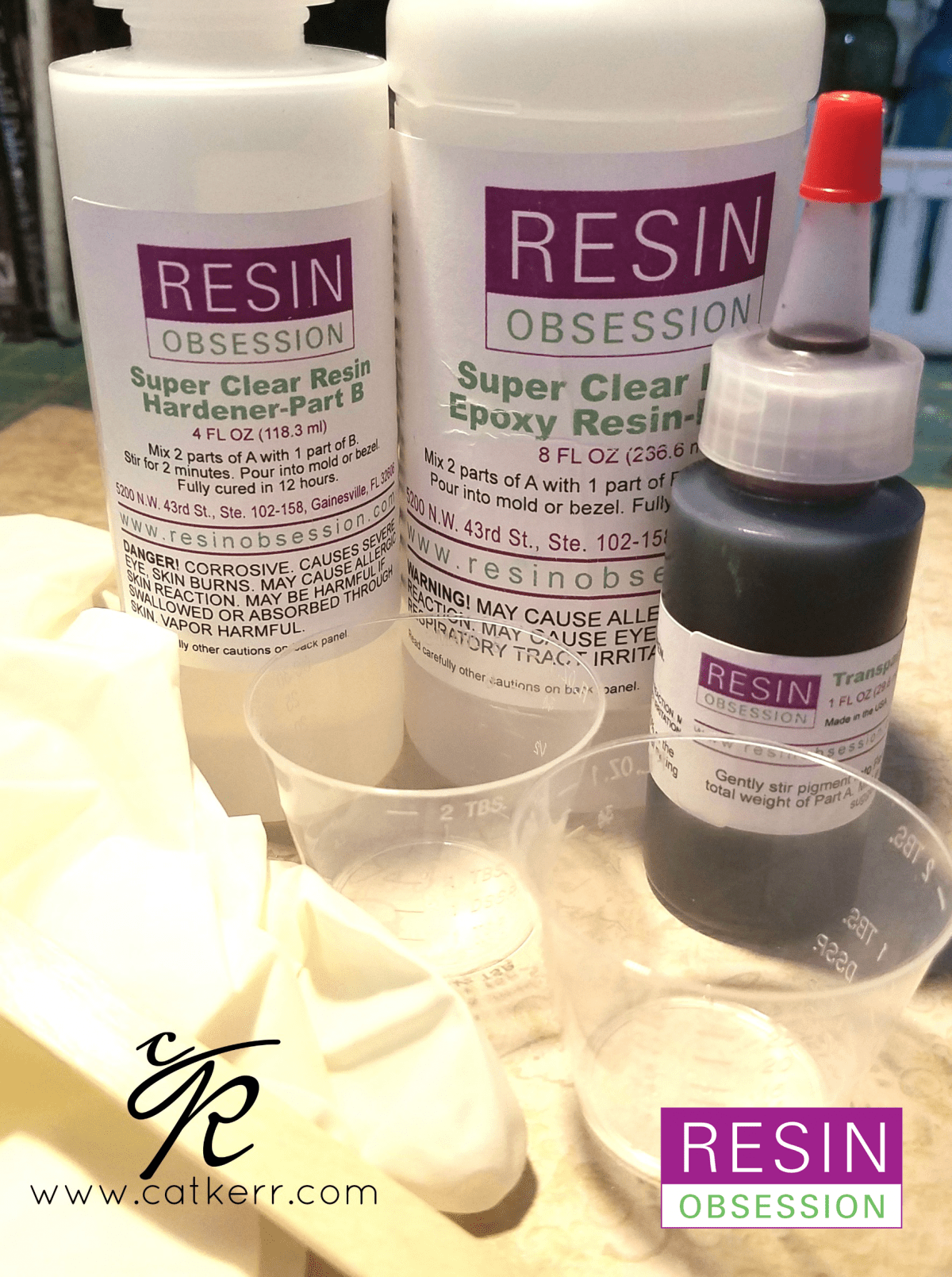 Bottles of two-part resin and supplies