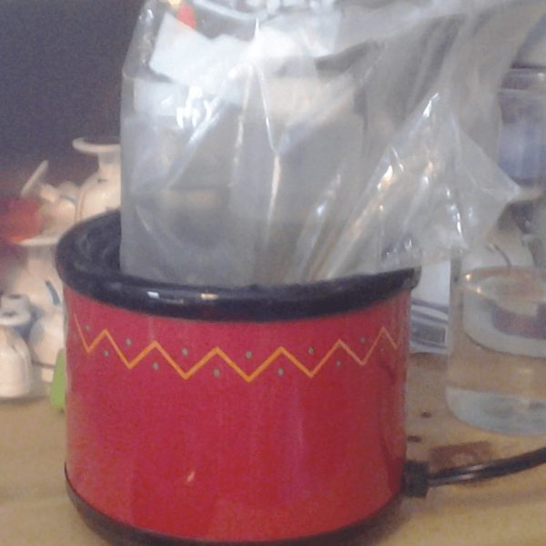 A plastic bag in a salsa pot.