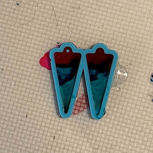 resin earrings in mold