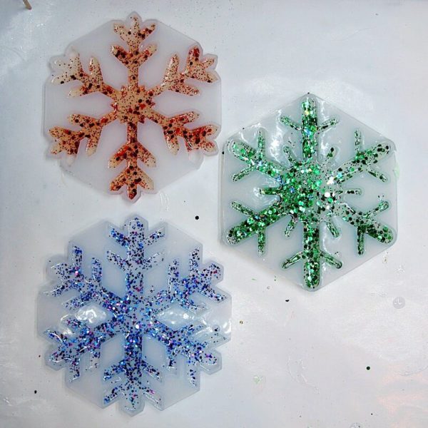 snowflake molds filled with resin