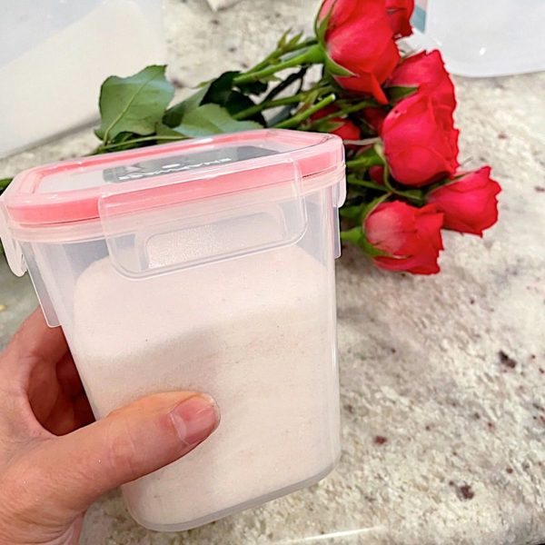 Flowers drying in a container