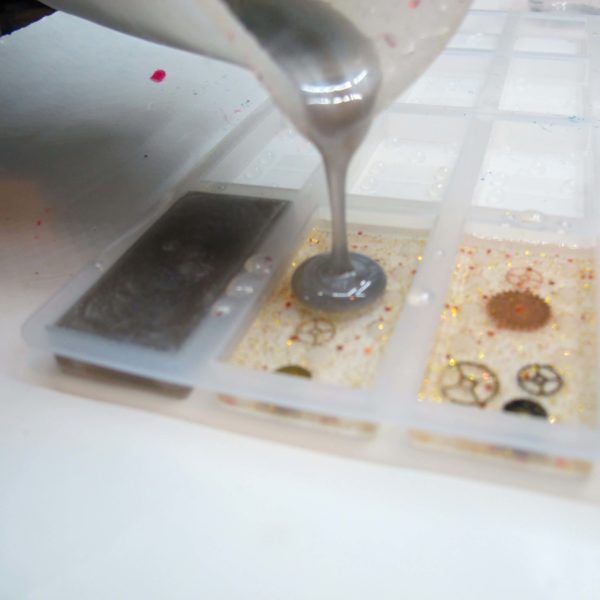adding silver epoxy to a mold