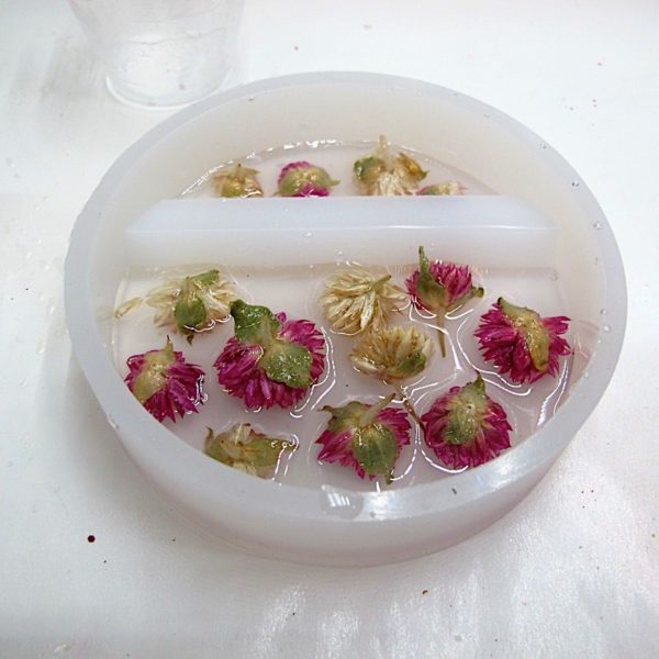 first layer of resin and flowers