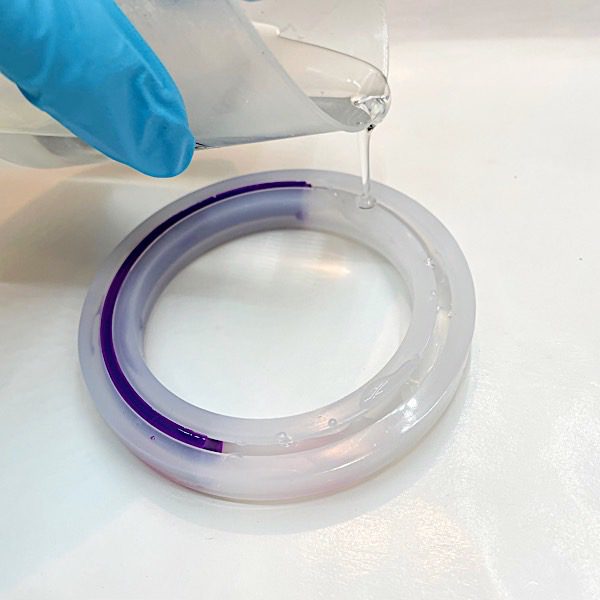 adding clear epoxy to mold