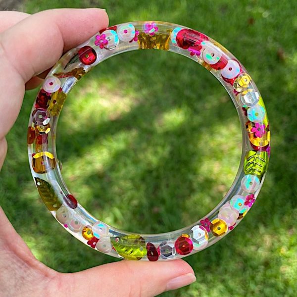resin bangle with clear epoxy and sequins