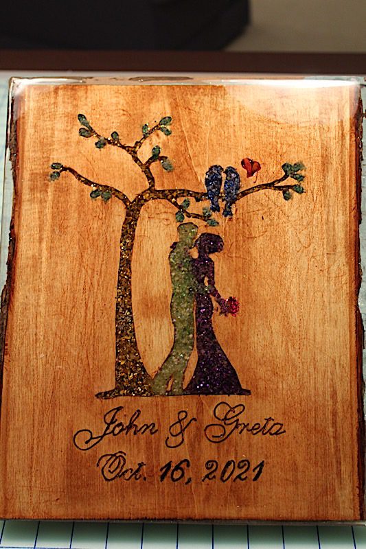 wood plaque with gemstones and epoxy resin